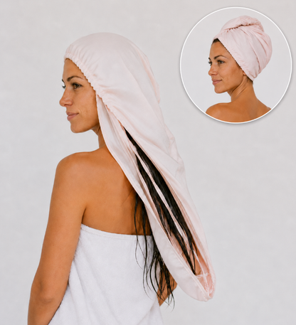 Woman wearing Blush Mauve Luma 3-layer hair towel wrap with long wet hair inside